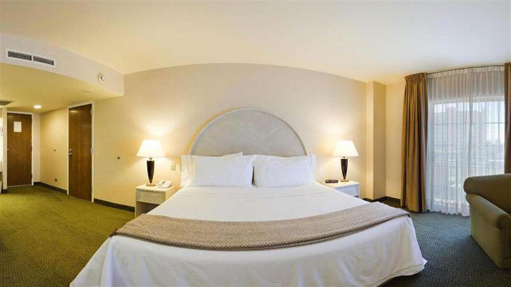 Istay Hotel Ciudad Juárez Extérieur photo A typical bedroom at the hotel